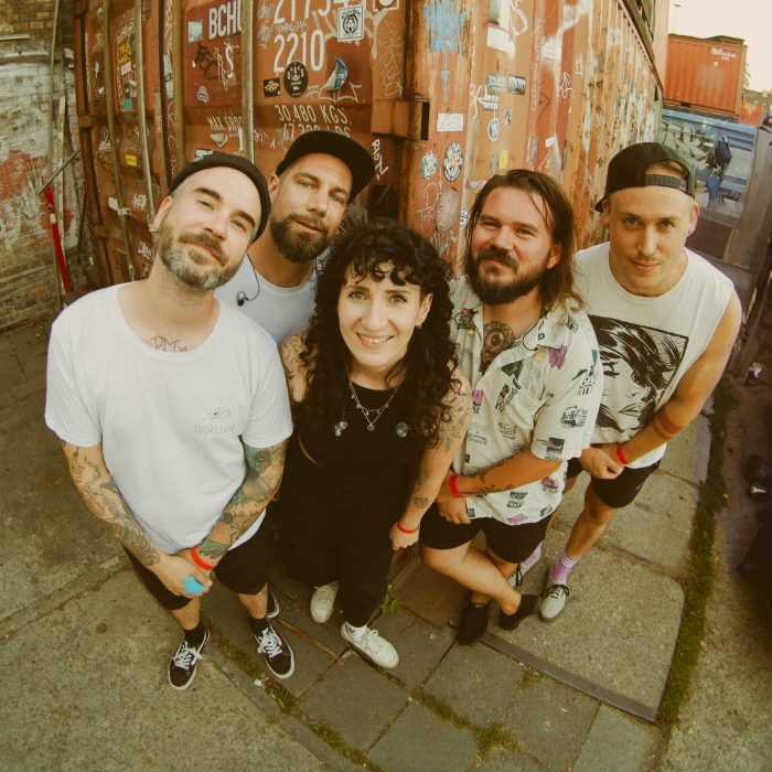 Melonball press pic by Shmagi Liklikadze Five members of Melonball standing outsite moments before the show.